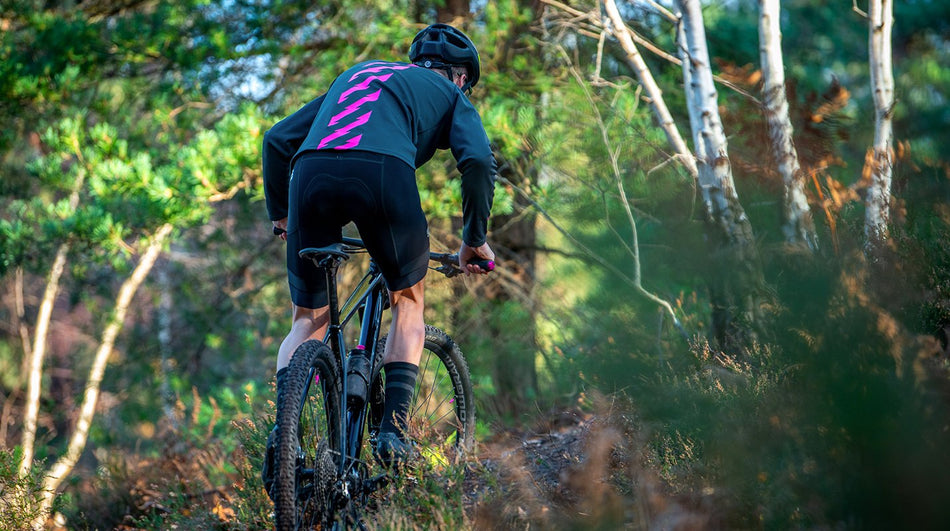 Rider demonstrating the jersey's stretch and mobility